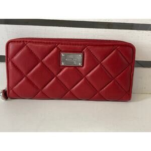 MICHAEL KORS, LARGE RED LEATHER QUILTED ZIP AROUND WALELT